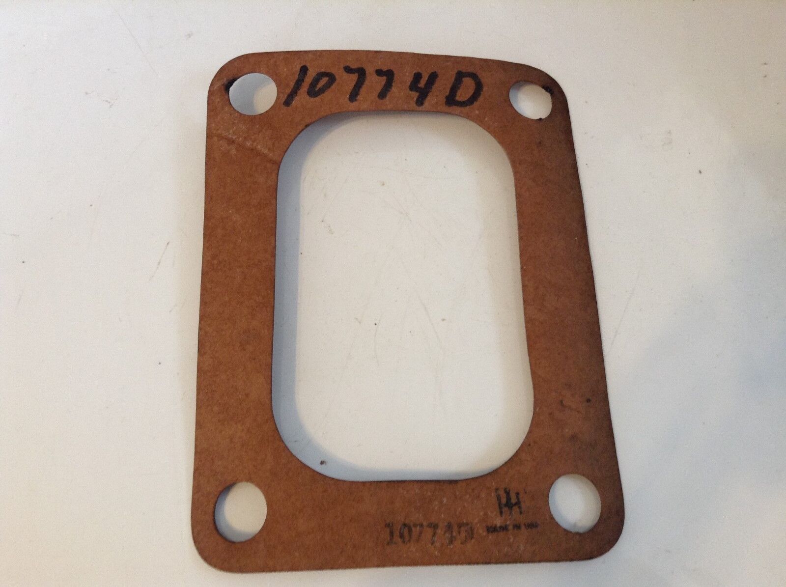 10774D - Is A New Radiator Inlet Gasket For A McCormick Deering 10-20 Tractors.