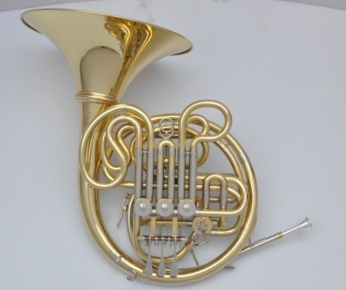Professional gold lacquer four key double French Horn.Bb/F by Eastern  Music