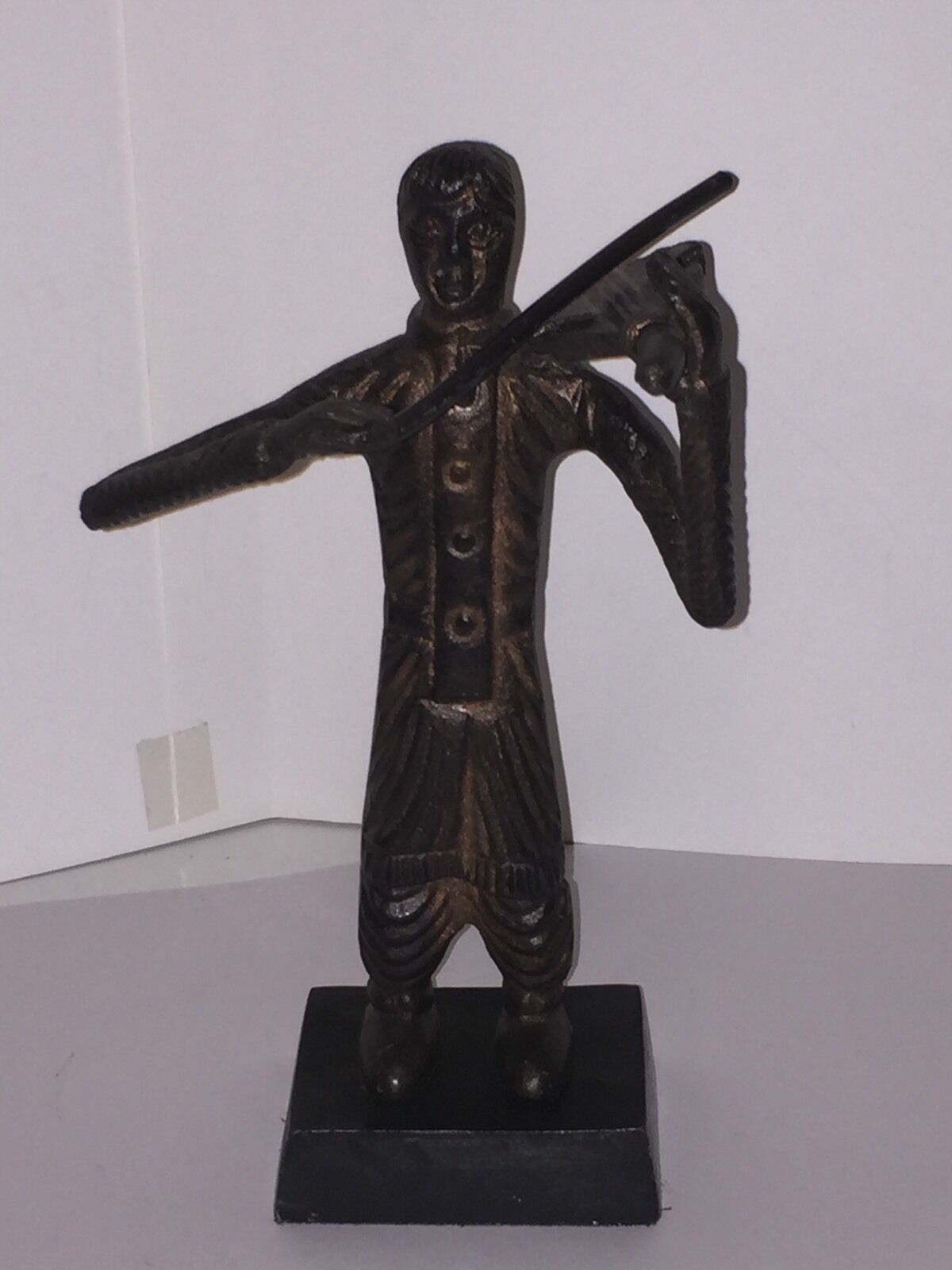 Cast Iron Figure of a Man in East Indian Clothing Playing the Violin