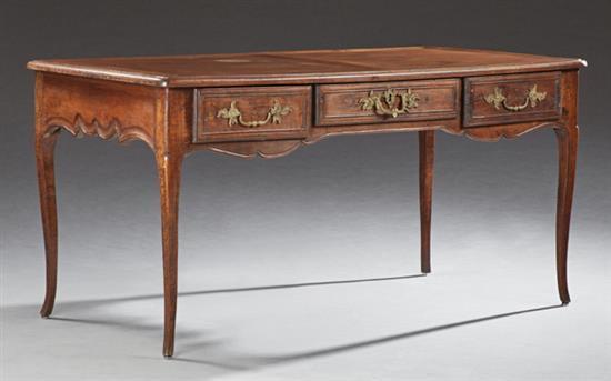 French Louis XV Style Carved Oak Desk, early 20th c., the rounded cor... Lot 997