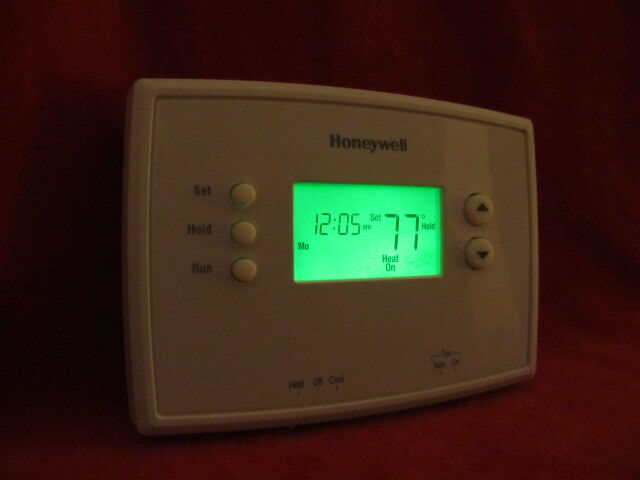 Honeywell RTH 2300 B Digital 5-2 Day Programmable Thermostat  Green display.