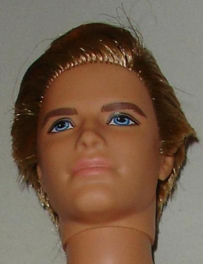 Nude blond Ken doll rooted hair monogrammed underwear and one bent arm left