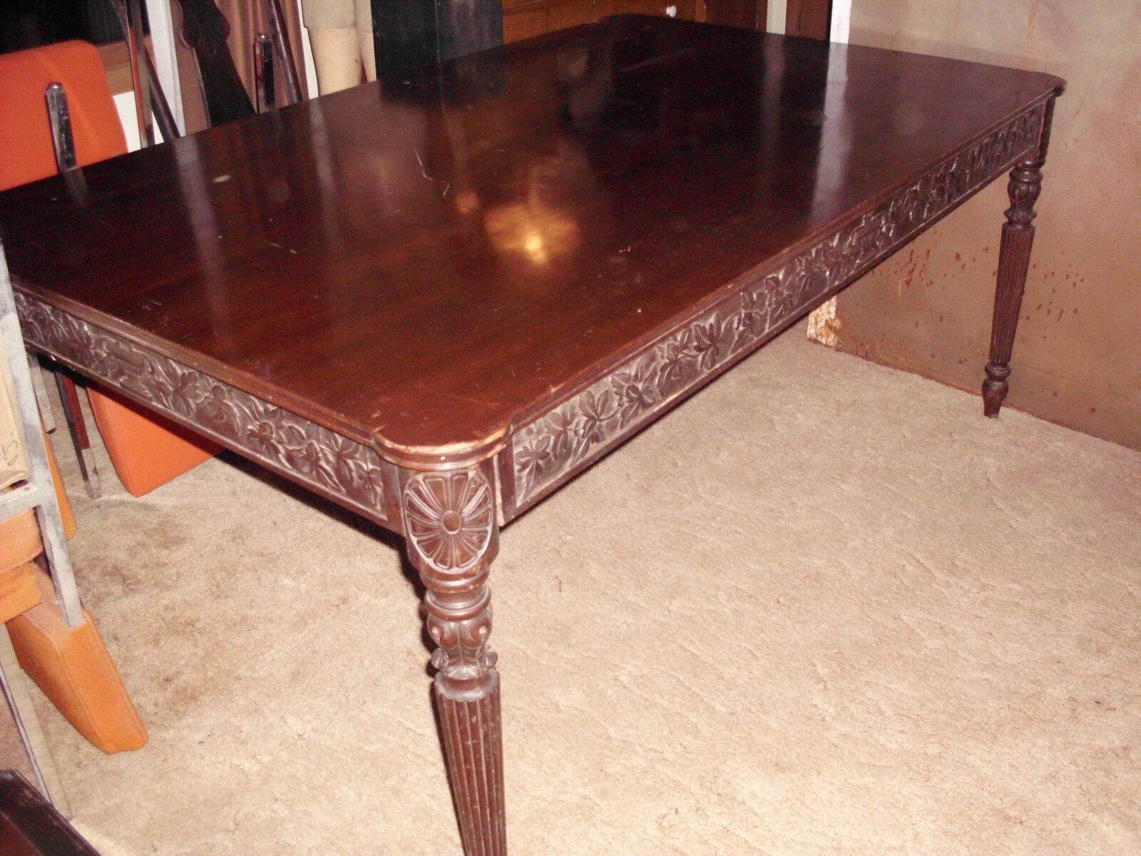 Hand carved walnut dining table